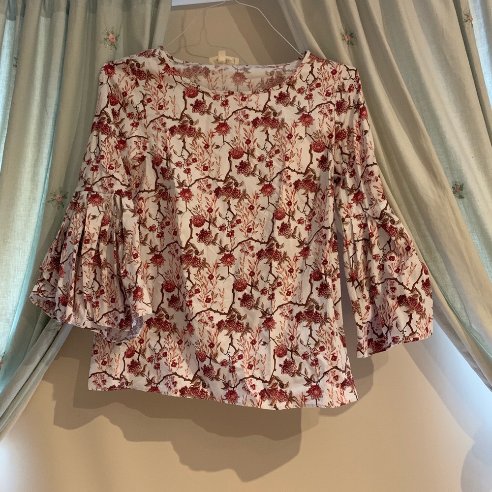 A white flowery shirt